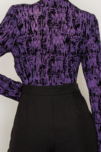 Top manga larga morado con negro